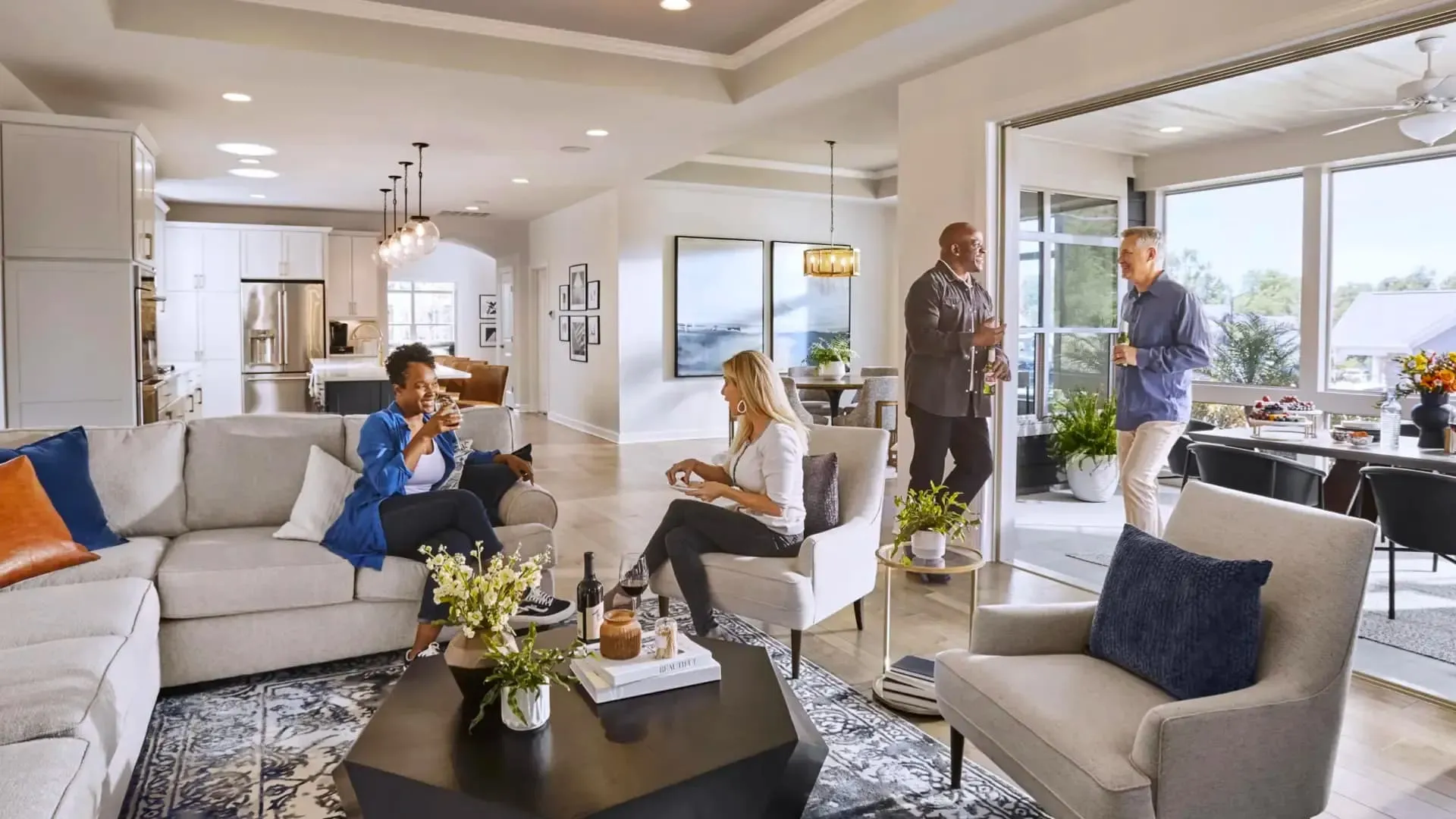 Friends socializing in modern open-concept living room