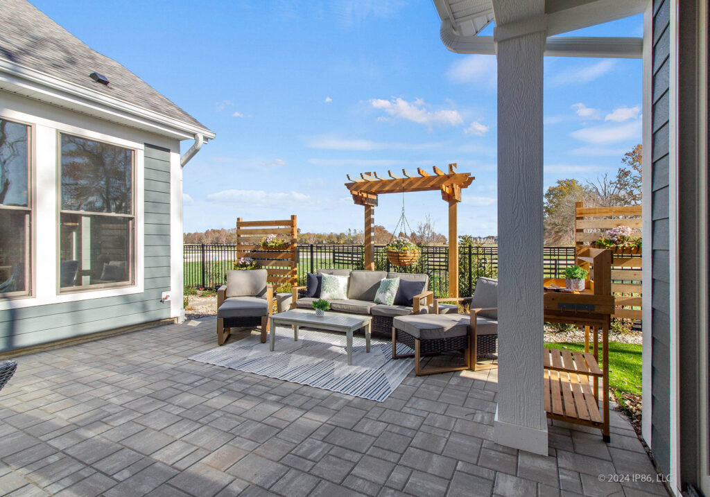 Modern backyard patio with pergola and seating